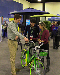 photo of people with electric bicycle